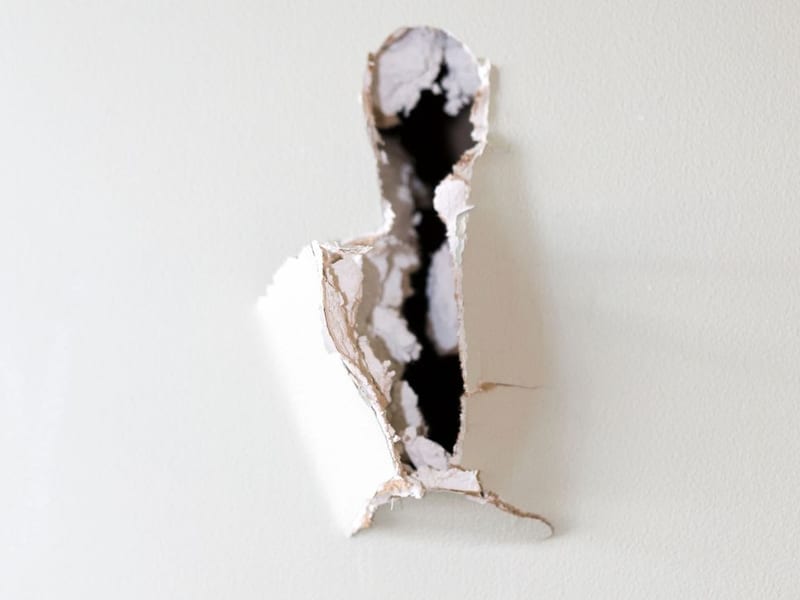 Drywall hole ready for patching